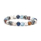 Handcrafted men’s bracelet with Belomorite, Dumortierite Blue, Aquamarine, Howlite, Botswana Agate, and Hematite beads on white background, designed for balance and clarity.